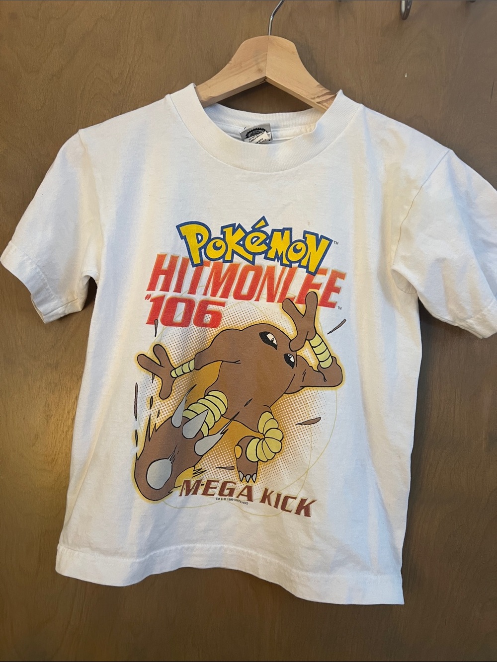 Nintendo White Kids Pokémon Hitmonlee Graphic Tee with Yellow & Orange Print